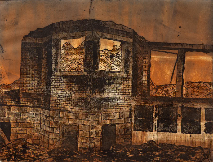 A large brick building that seems to be backlit by a soft orange glow.