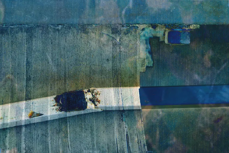 A bent/overlaid white and blue stick is framed by distressed green-blue background panels.